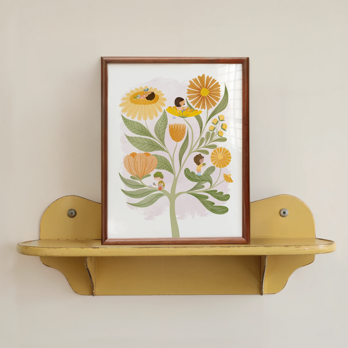 'noticing' art print, shown in a wood frame on a yellow shelf. print features 4 kids on various parts of flower. one has a magnifying glass and is looking at a snail, one has binoculars and is looking at a flower, one has a camera pointed to the sky, and one has a notepad.