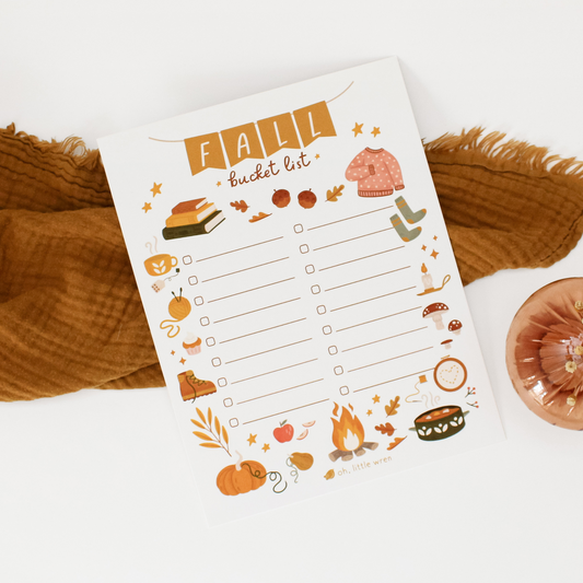 fill-in-the-blank style fall bucketlist printable with cozy fall illustrations likes sweaters, soup, tea, and pumpkins in warm fall colors.
