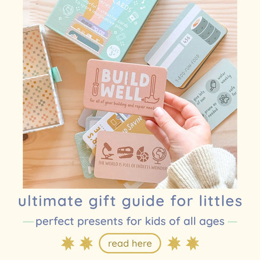 ultimate gift guide for littles. perfect presents for kids of all ages. 'read here' picture of a kid holiding a wallet card that says 'build well'
