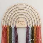 load image into gallery viewer, personalized wood and yarn rainbow wall hanging
