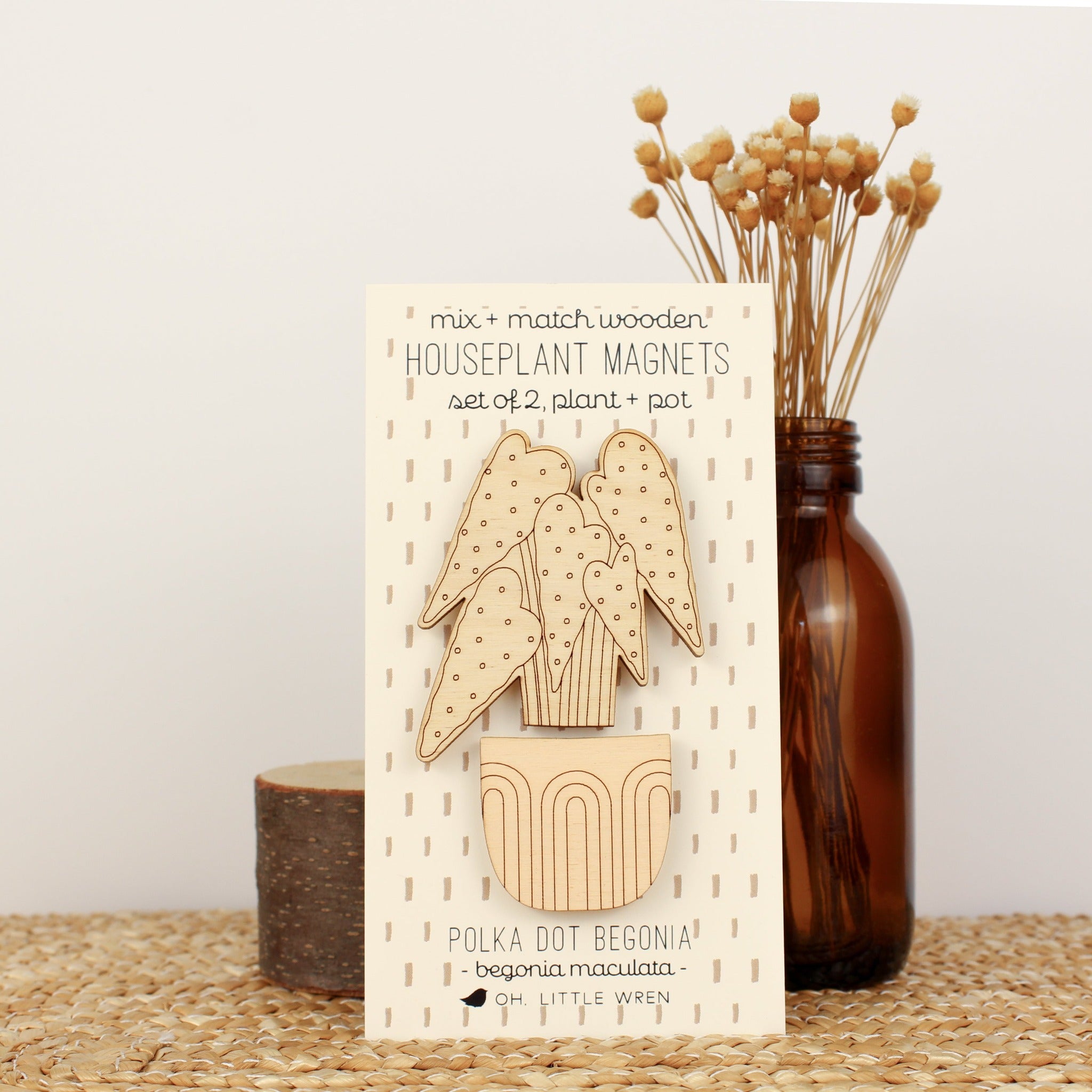 wooden plant and pot magnet pair. with polka dot begonia plant and light peach pot.