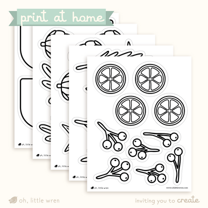 coloring page printables with elements to make your own winter garlands like pine branches, orange slices, and banners.