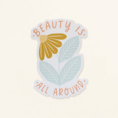 flower vinyl sticker in mustard and dusty blue with words beauty is all around us in peach