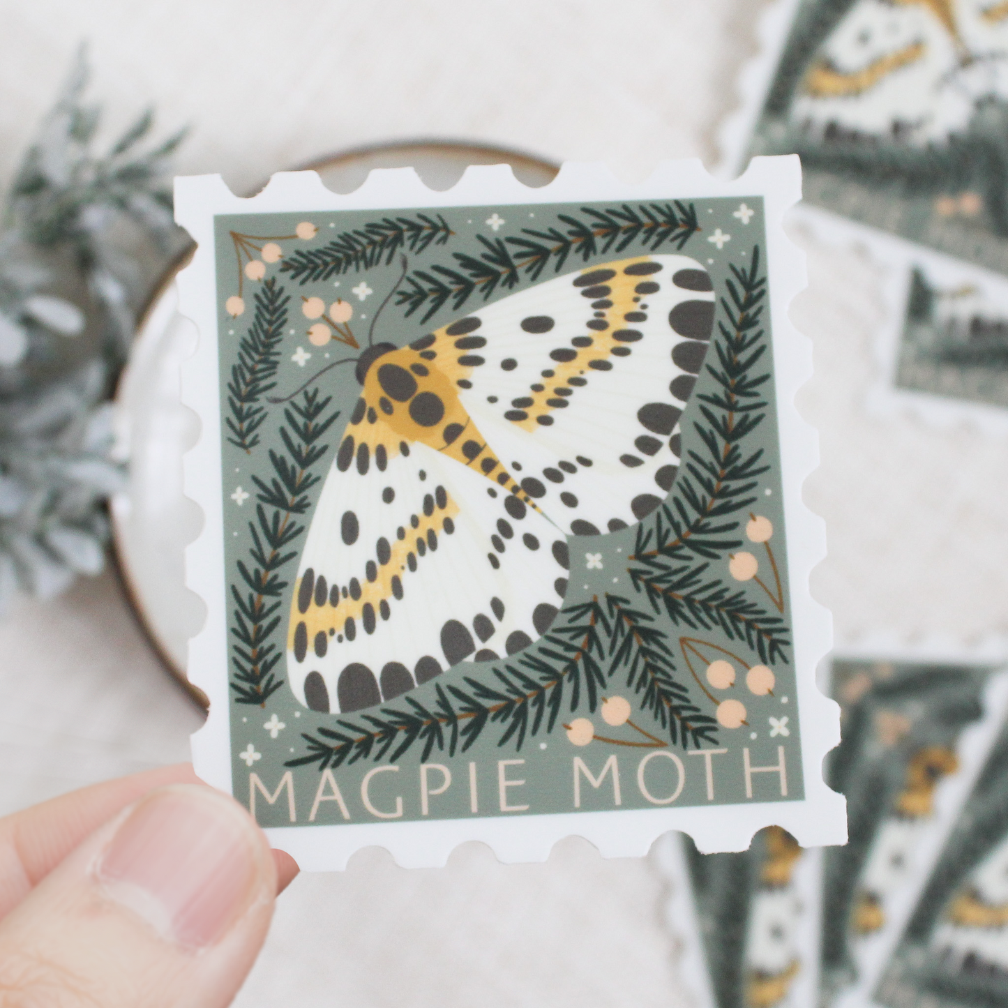 Magpie moth, stamp shaped vinyl sticker