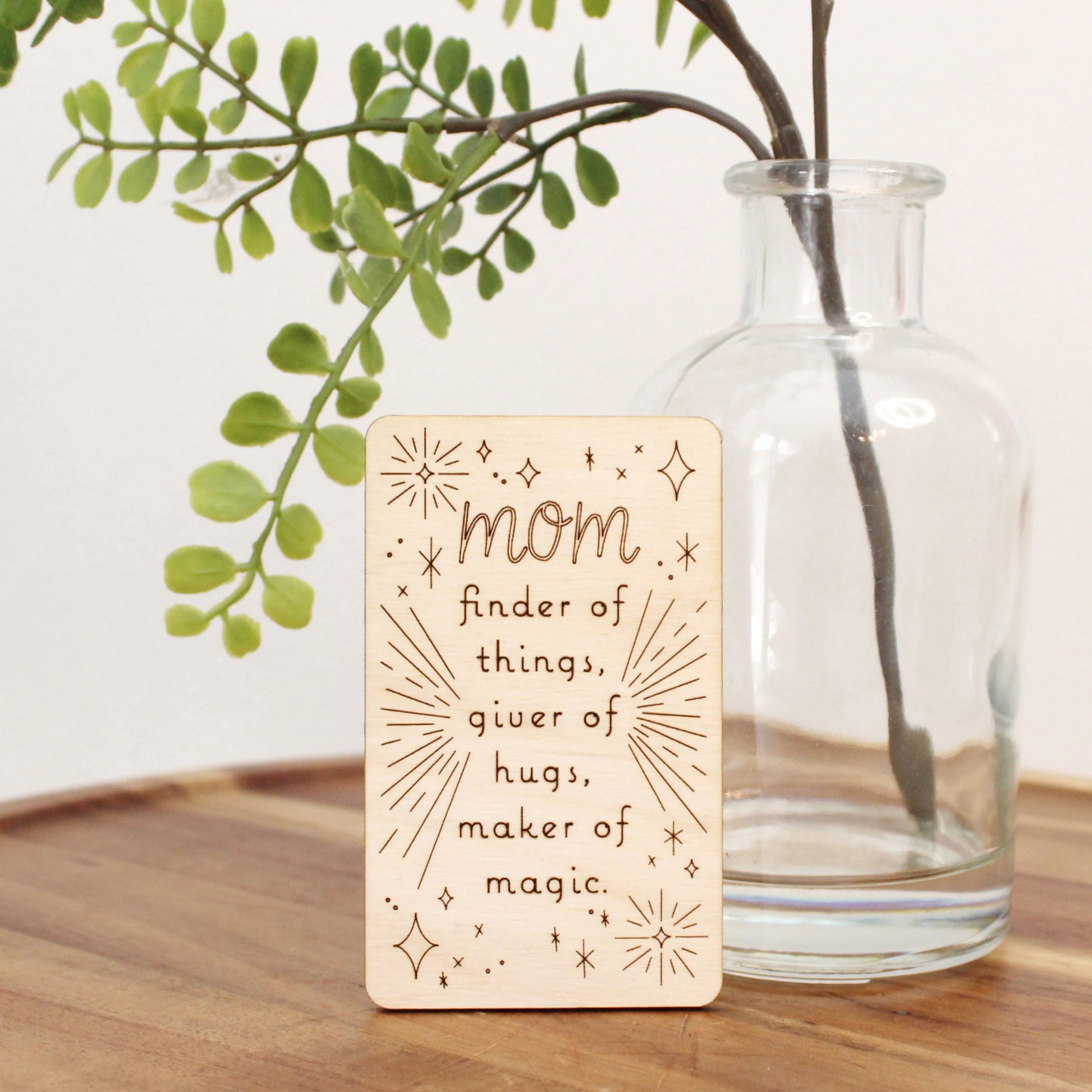 mini wood mother's day card that reads "mom finder of things, giver of hugs, maker of magic'