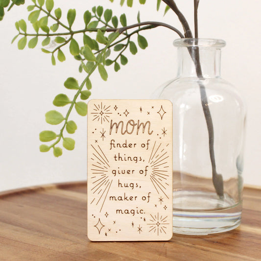 mini wood mother's day card that reads "mom finder of things, giver of hugs, maker of magic'