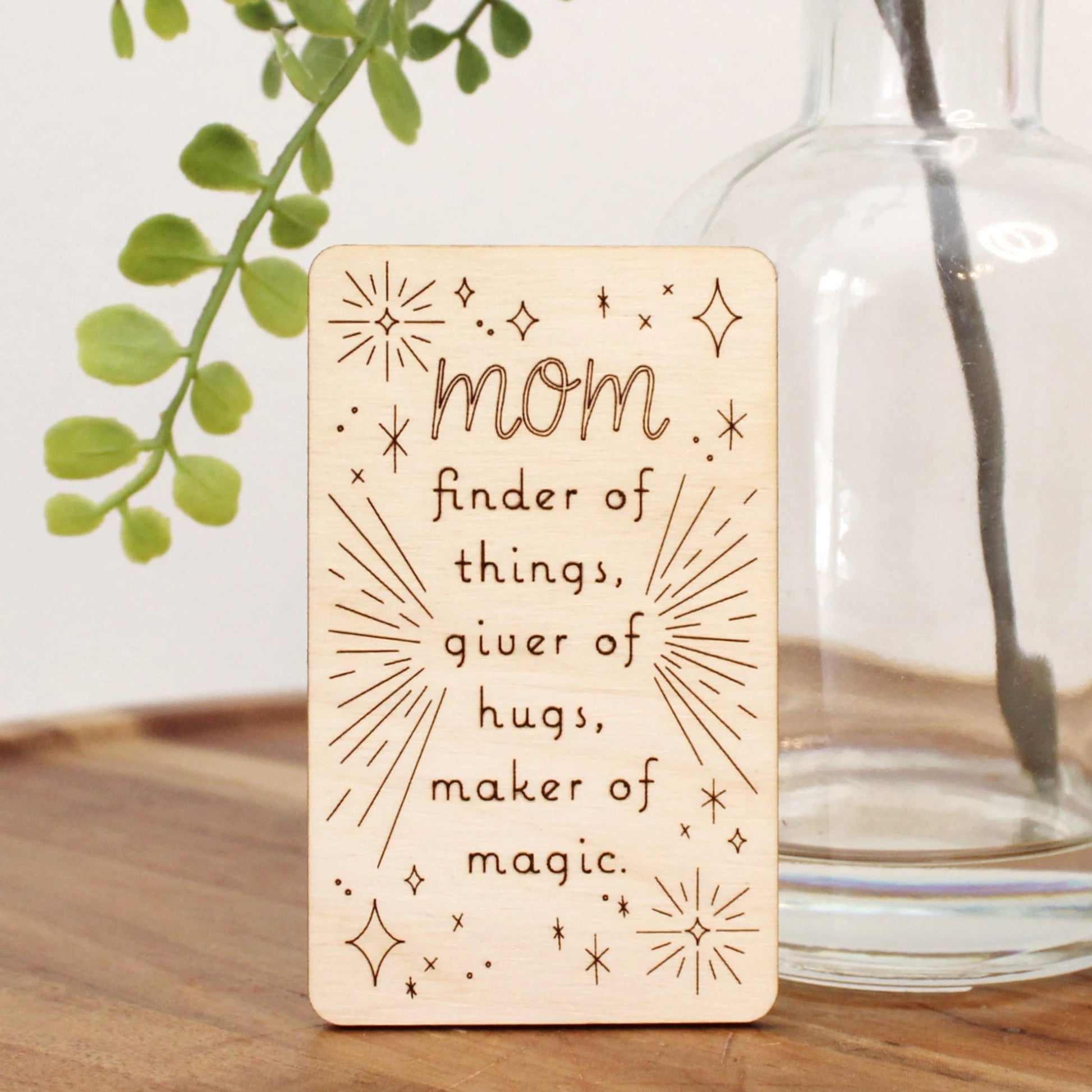 mini wood mother's day card that reads "mom finder of things, giver of hugs, maker of magic'
