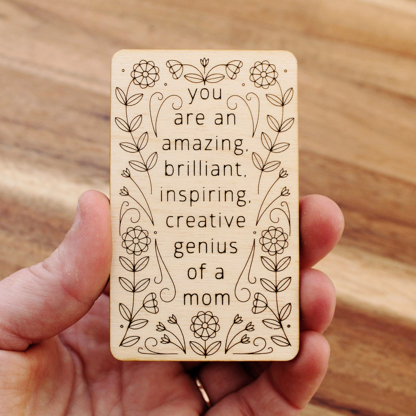 mini wooden mother's day card that reads 'you are an amazing, brilliant, inspiring, creative genius of a mom'