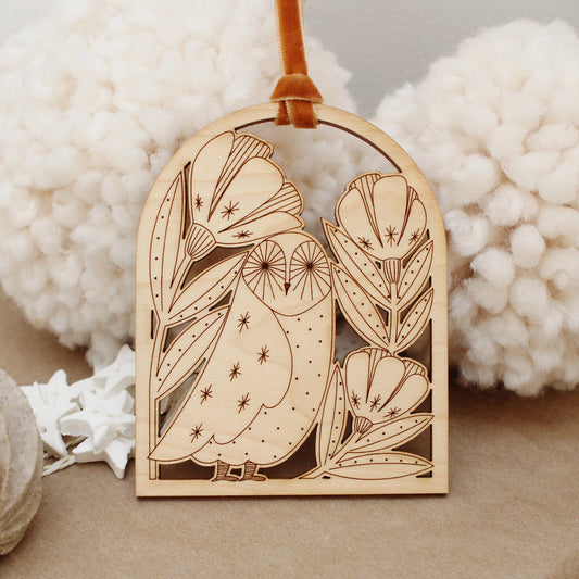 wooden owl arch shaped ornament with etched flowers