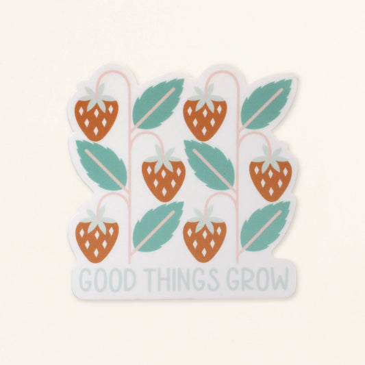 strawberry vinyl sticker in red and green with the words good things grow in light blue