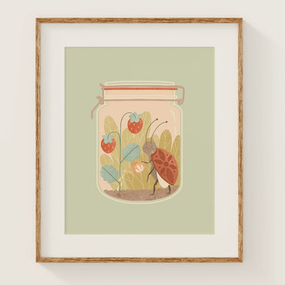 'tending to it' art print, shown in a wood frame. print features a ladybug watering her strawberry plants, inside of a jar