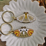 load image into gallery viewer, moth enamel keychains
