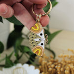load image into gallery viewer, moth enamel keychains
