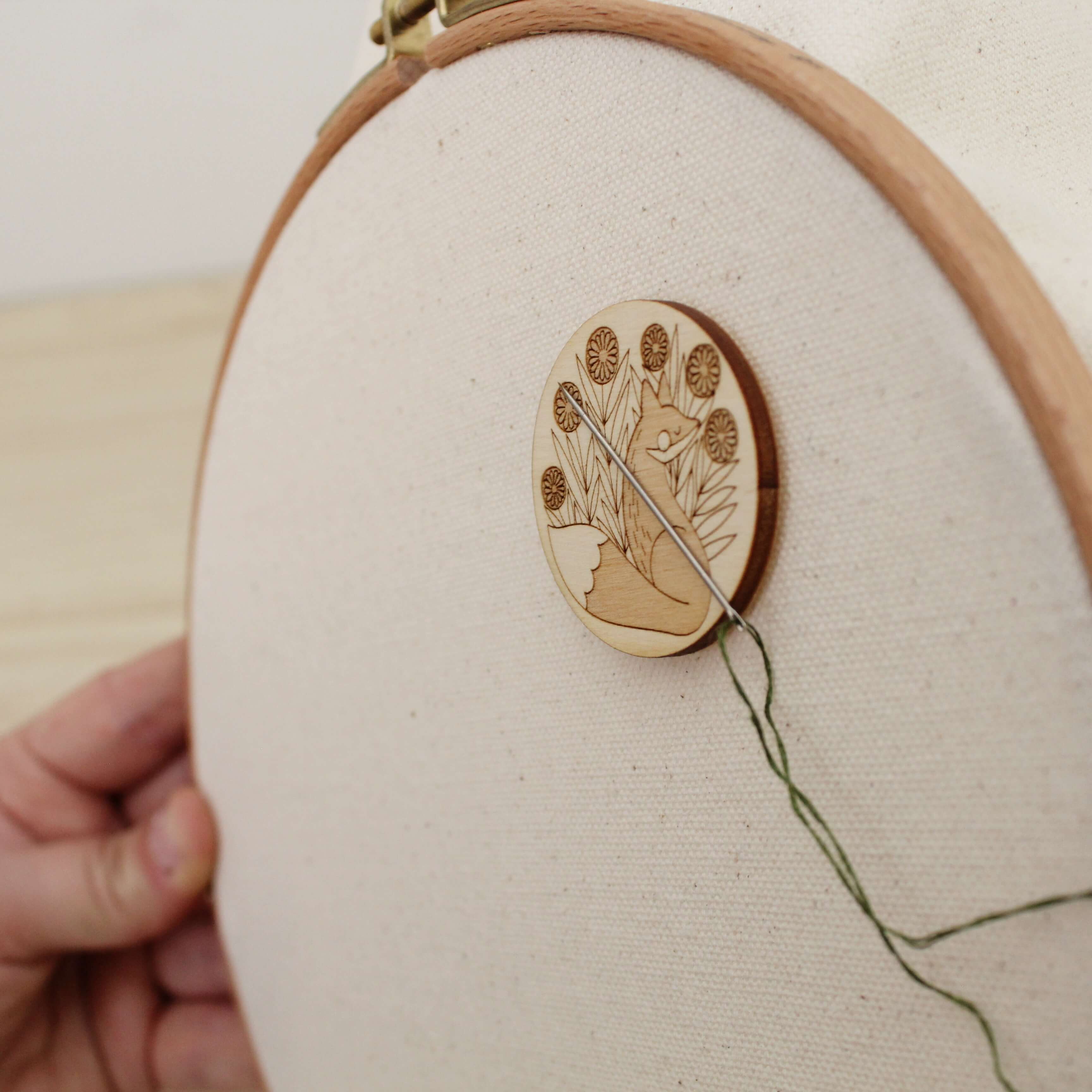 forest fox wooden needle minder