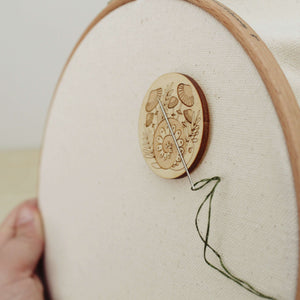forest snail wooden needle minder