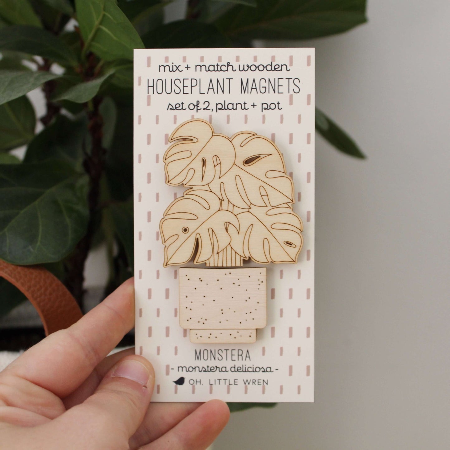 wooden plant and pot magnet pair. with monstera plant and white pot.