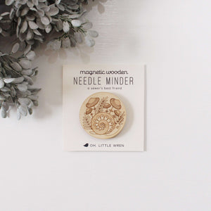 forest snail wooden needle minder