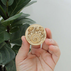 forest snail wooden needle minder