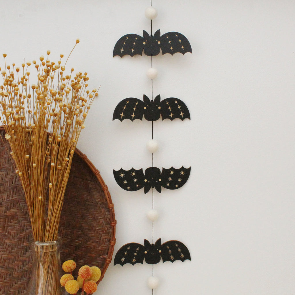 vertical bats wooden folk halloween garland, black and white starburst