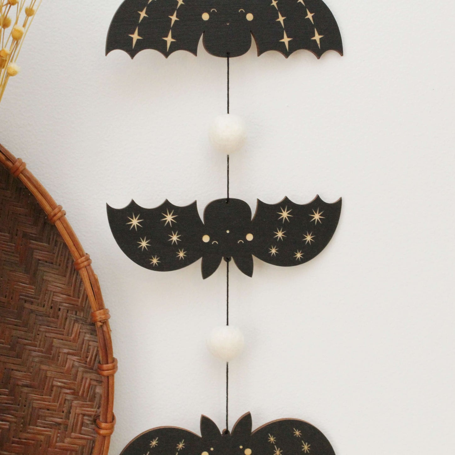 vertical bats wooden folk halloween garland, black and white starburst