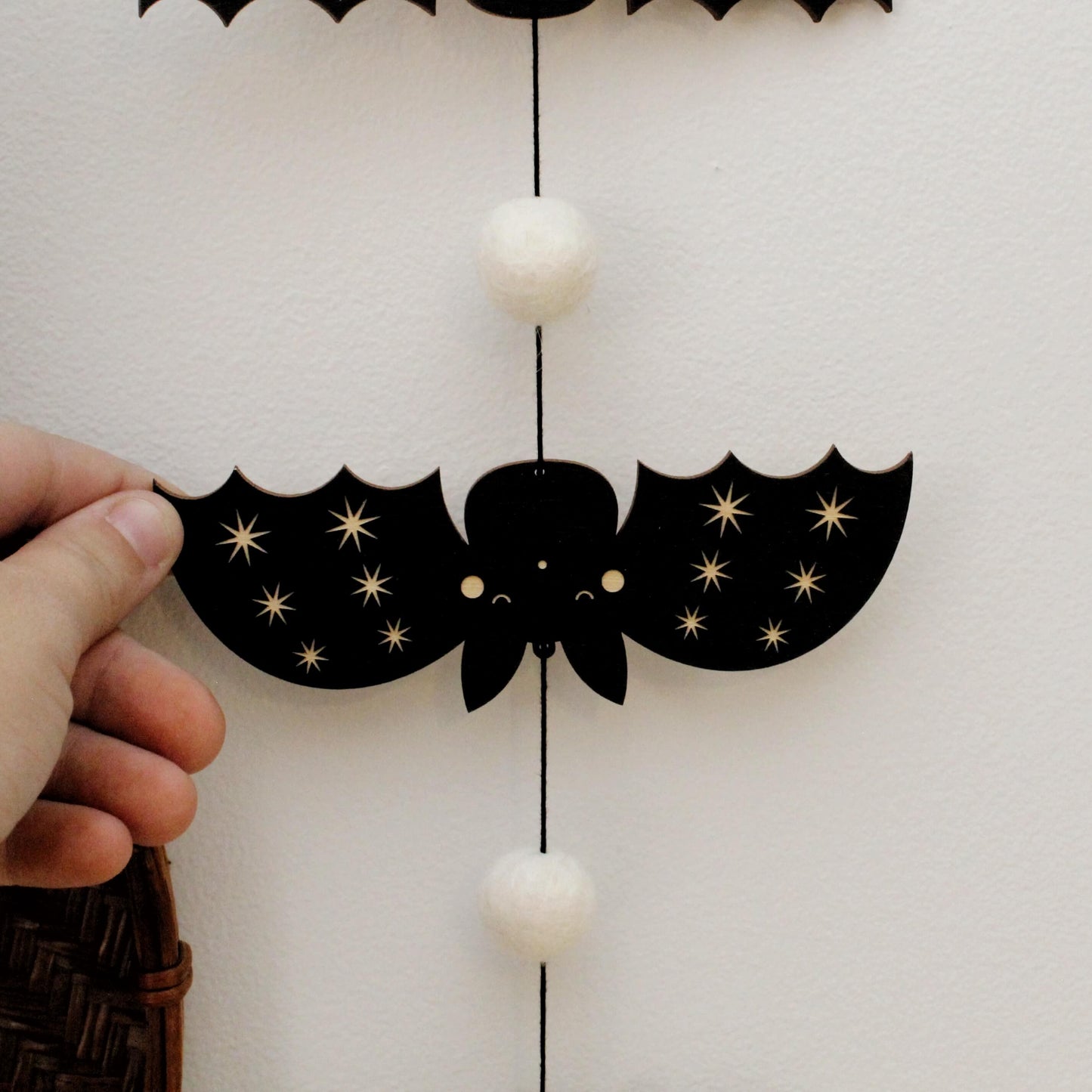 vertical bats wooden folk halloween garland, black and white starburst