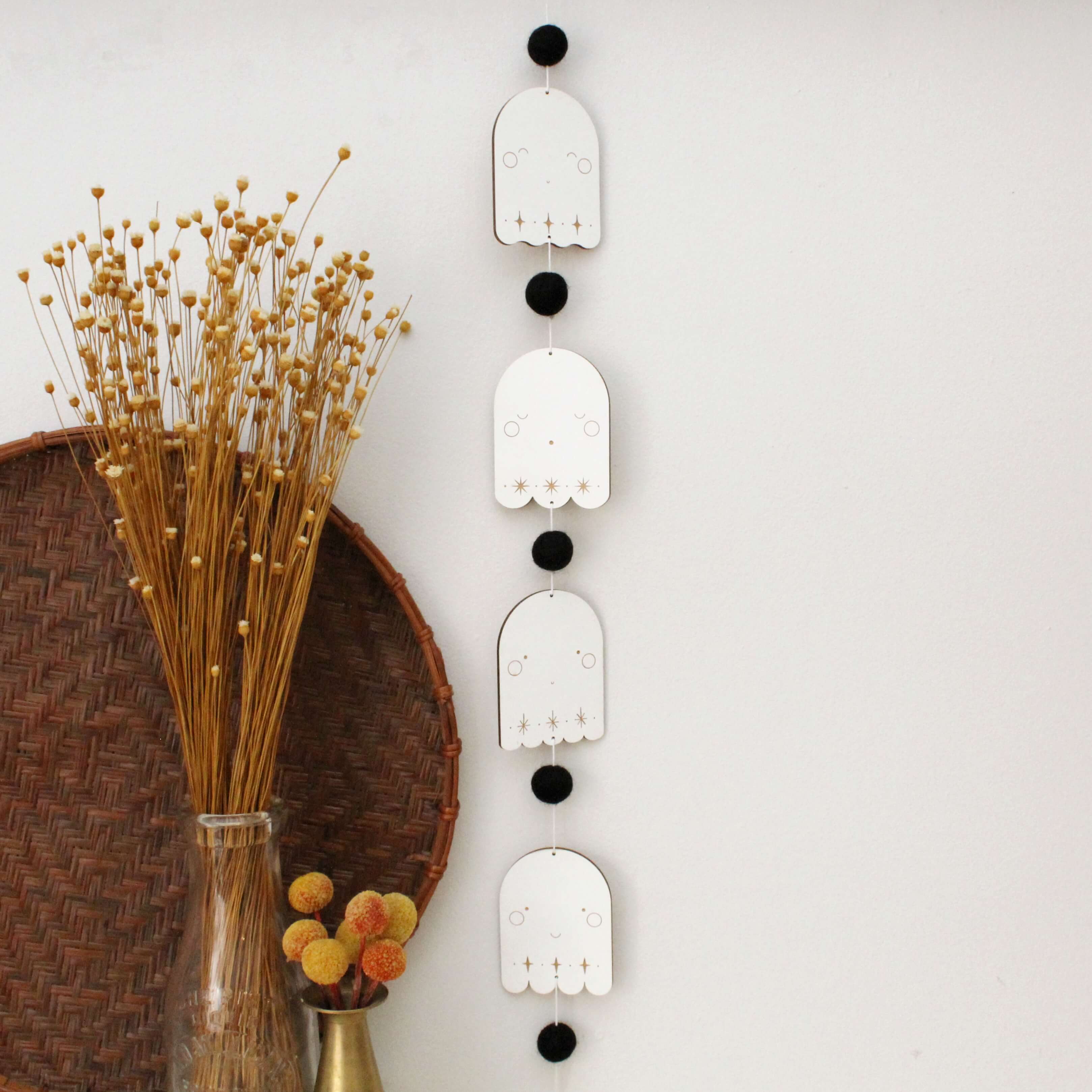 vertical ghosts wooden folk halloween garland, black and white starburst