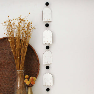 vertical ghosts wooden folk halloween garland, black and white starburst