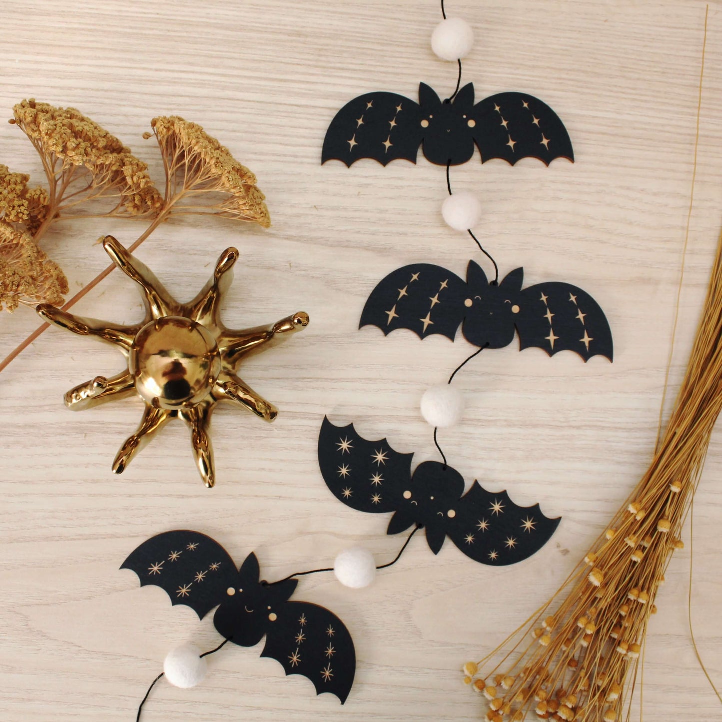 vertical bats wooden folk halloween garland, black and white starburst