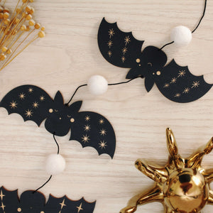 vertical bats wooden folk halloween garland, black and white starburst