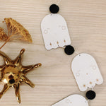 load image into gallery viewer, vertical ghosts wooden folk halloween garland, black and white starburst
