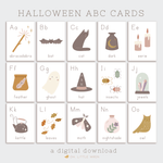 load image into gallery viewer, halloween themed alphabet cards for letters a to z for preschool learning. muted colors and not so spooky illustrations.

