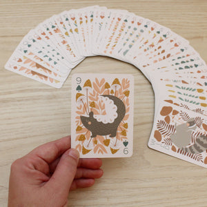 a woodland, forest themed deck of cards featuring beautifully illustrated animals, flowers and mushrooms. 