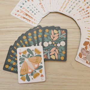 a woodland, forest themed deck of cards featuring beautifully illustrated animals, flowers and mushrooms. 