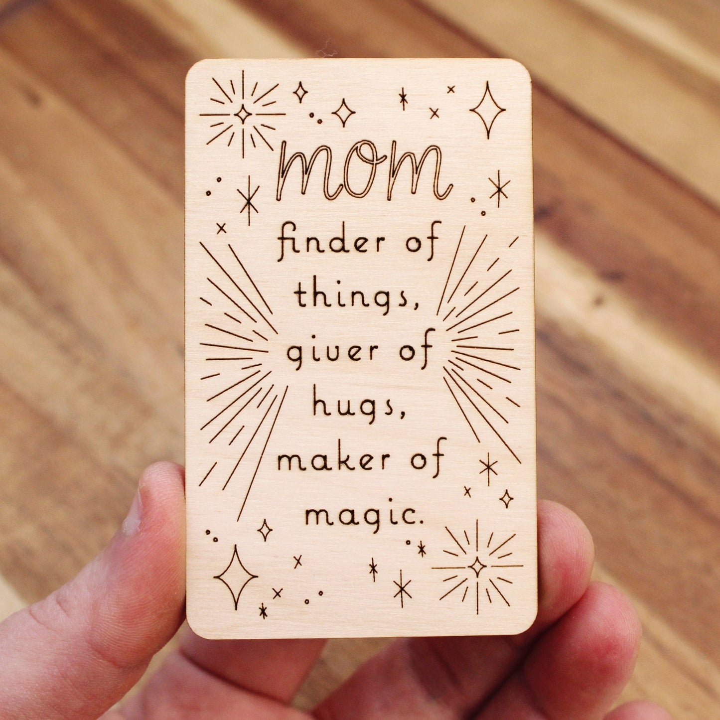 mini wood mother's day card that reads "mom finder of things, giver of hugs, maker of magic'