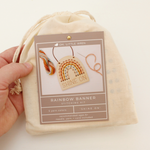 load image into gallery viewer, wooden rainbow banner stitching kit with shine on text and and yarn to stitch yourself.
