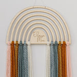 load image into gallery viewer, personalized wood and yarn rainbow wall hanging
