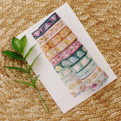 assorted washi tape illustrated with flowers, animals, and insects. cheerful and colorful.