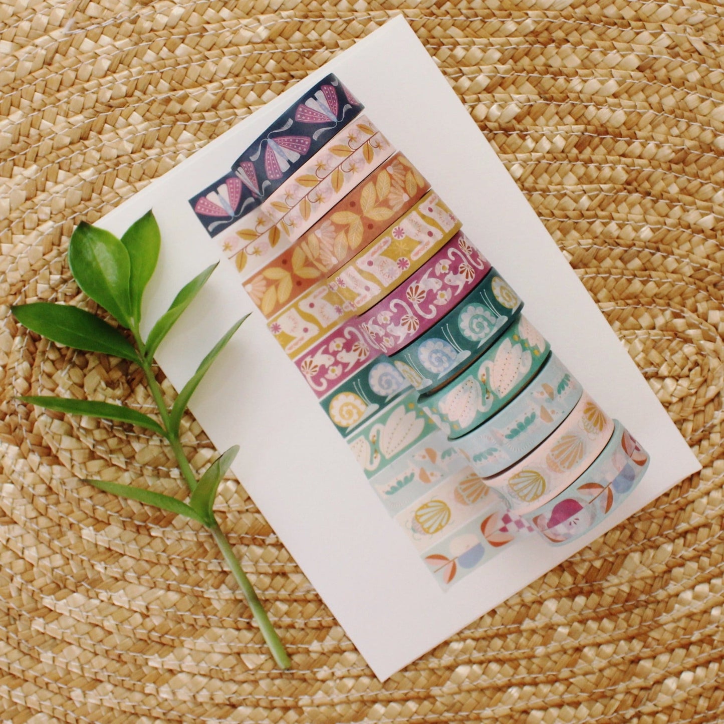 assorted washi tape illustrated with flowers, animals, and insects. cheerful and colorful.