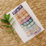 load image into gallery viewer, assorted washi tape illustrated with flowers, animals, and insects. cheerful and colorful.
