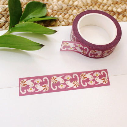 washi tape with cute cats and flowers on a rich plum background.