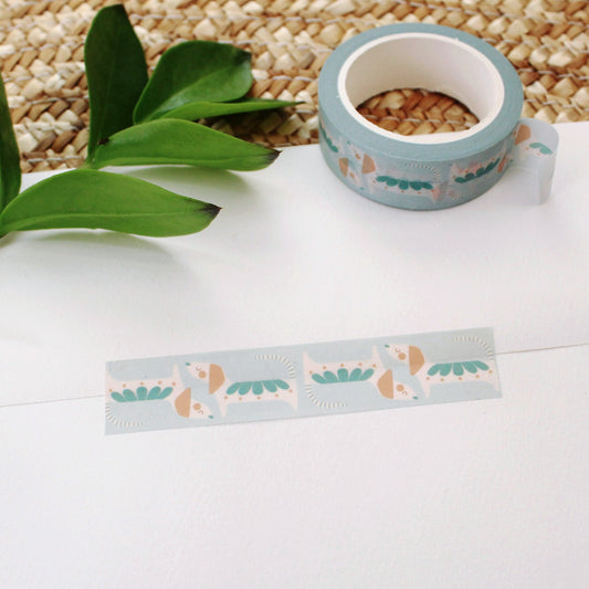 cute dog washi tape with turquoise and peach on a baby blue background