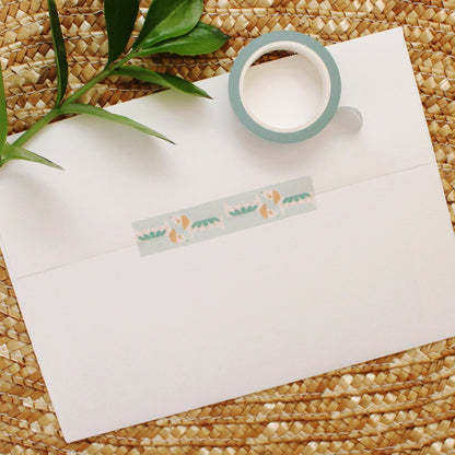 cute dog washi tape with turquoise and peach on a baby blue background