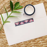load image into gallery viewer, washi tape with purple, blue and pink moths on a deep navy background.
