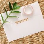 load image into gallery viewer, adorable pink strawberry washi tape with mustard yellow leaves on a cream background.
